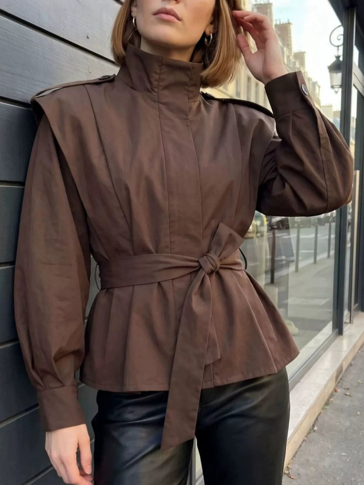 Trendsi stand-collar belted outerwear featuring a stylish design, front belt, and tailored fit, perfect for cool weather.