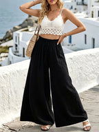 Wide leg drawstring pants by Shopimist, featuring a relaxed fit and adjustable waist, shown in a neutral fabric.