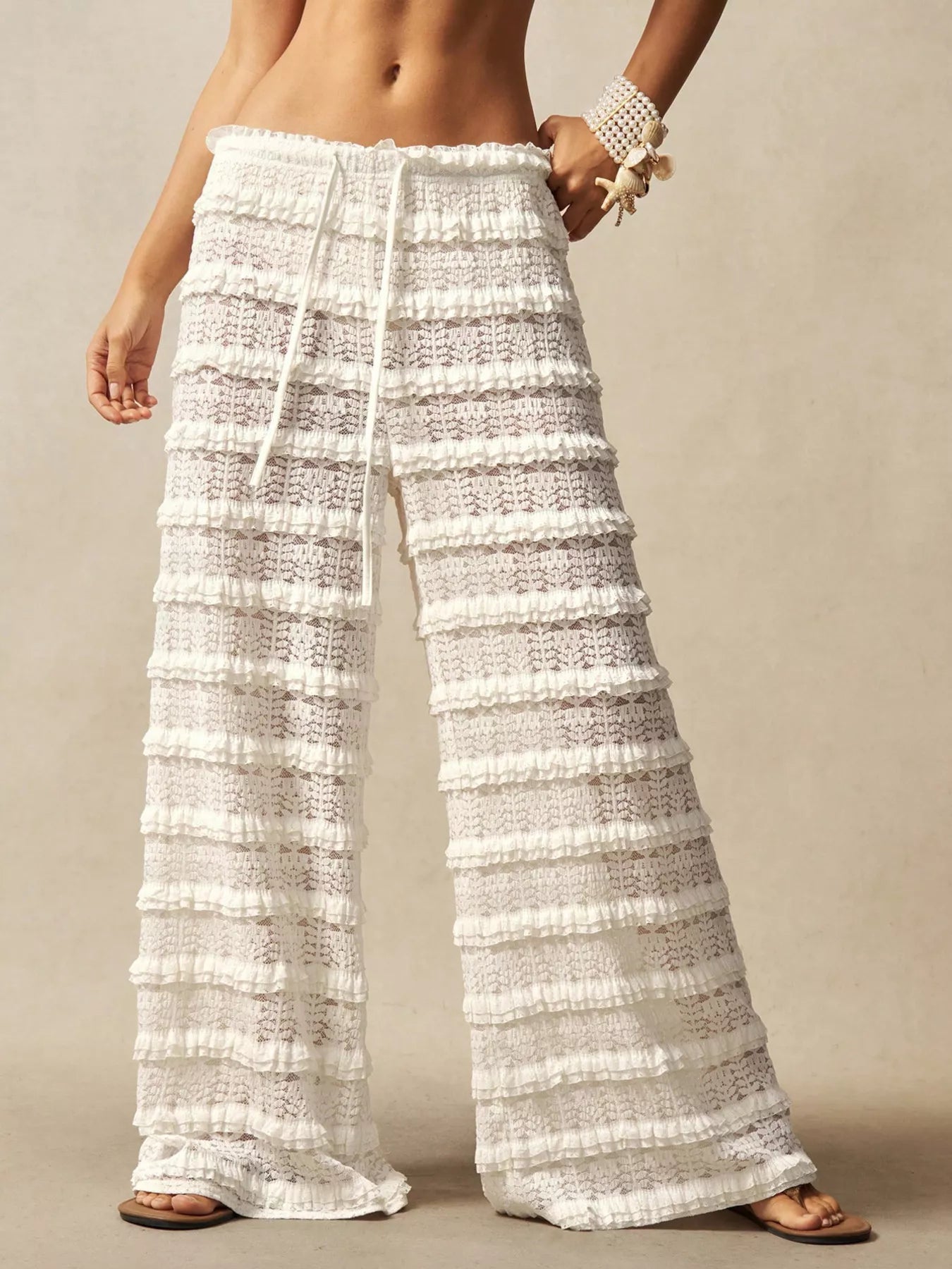 Plush Fashion Hub lace drawstring wide-leg pants with flowing fabric and relaxed fit, perfect for casual or stylish outfits.