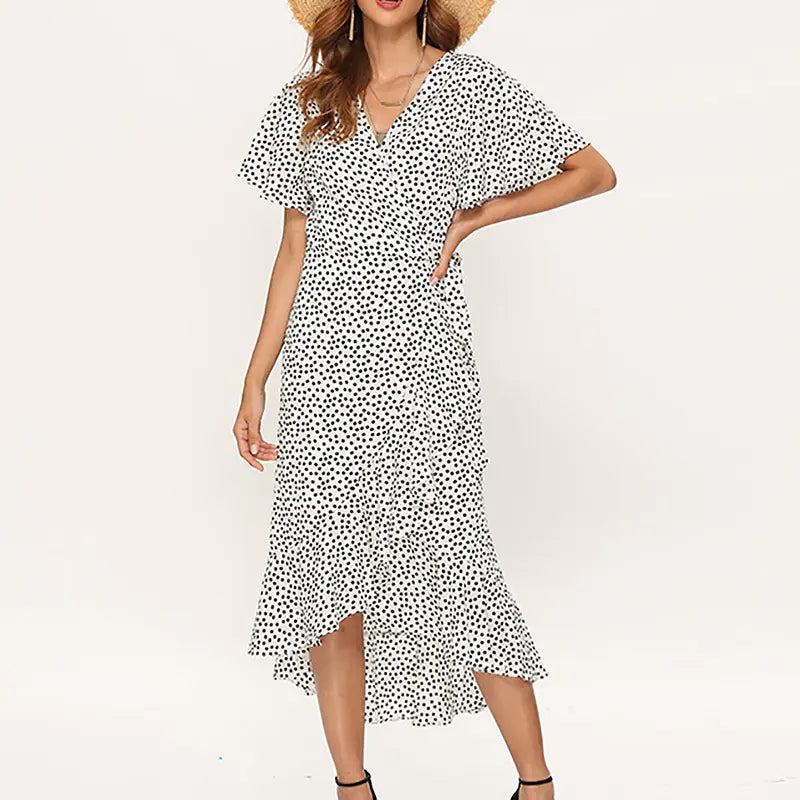 Women’s summer floral high-waist V-neck chiffon dress with a flowy design, featuring vibrant floral patterns and lightweight fabric.