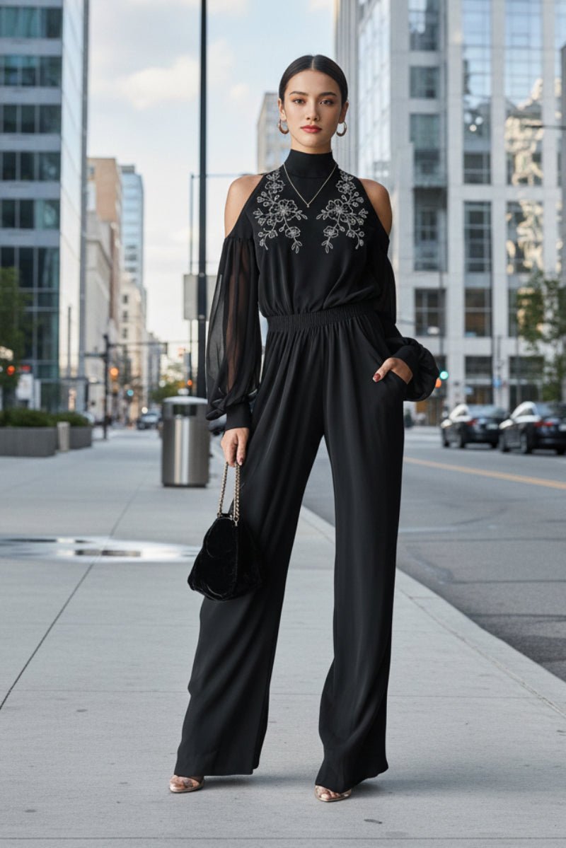 Black embroidered women's long-sleeve wide-leg jumpsuit, casualwear by Plush Fashion Hub, shown on a model.