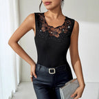 Black ribbed rhinestone-decorated vest T-shirt top, casualwear by Plush Fashion Hub, shown with stylish fit and shimmering embellishments.