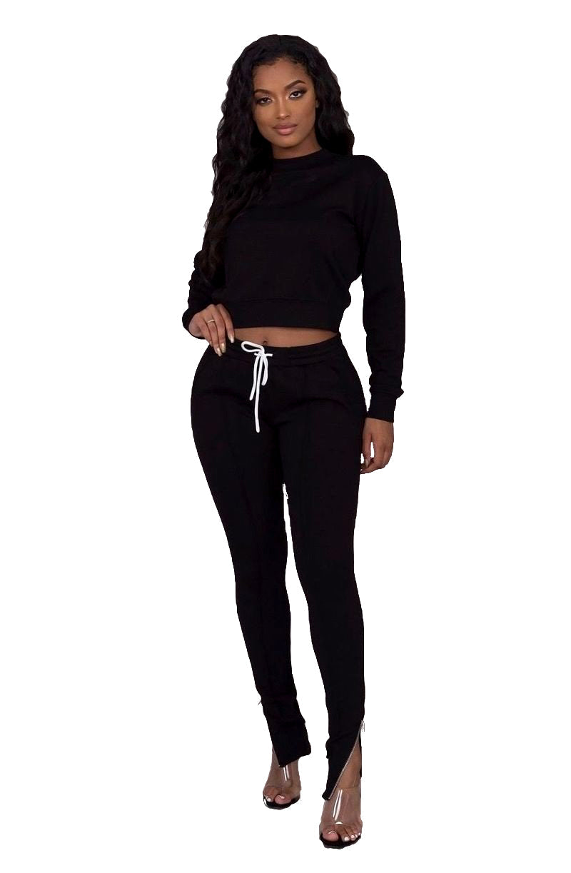 Black 2-piece jogging set from The House of Stylez, includes comfortable joggers and matching sweatshirt for active wear.