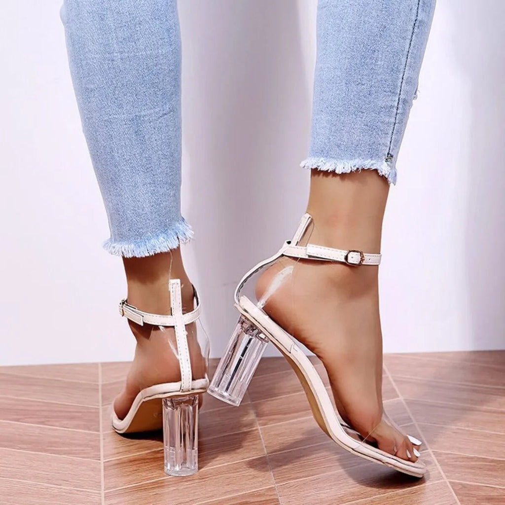 Women's faux leather block heel ankle strap sandals by Trendsi, featuring a chic design and comfortable fit.