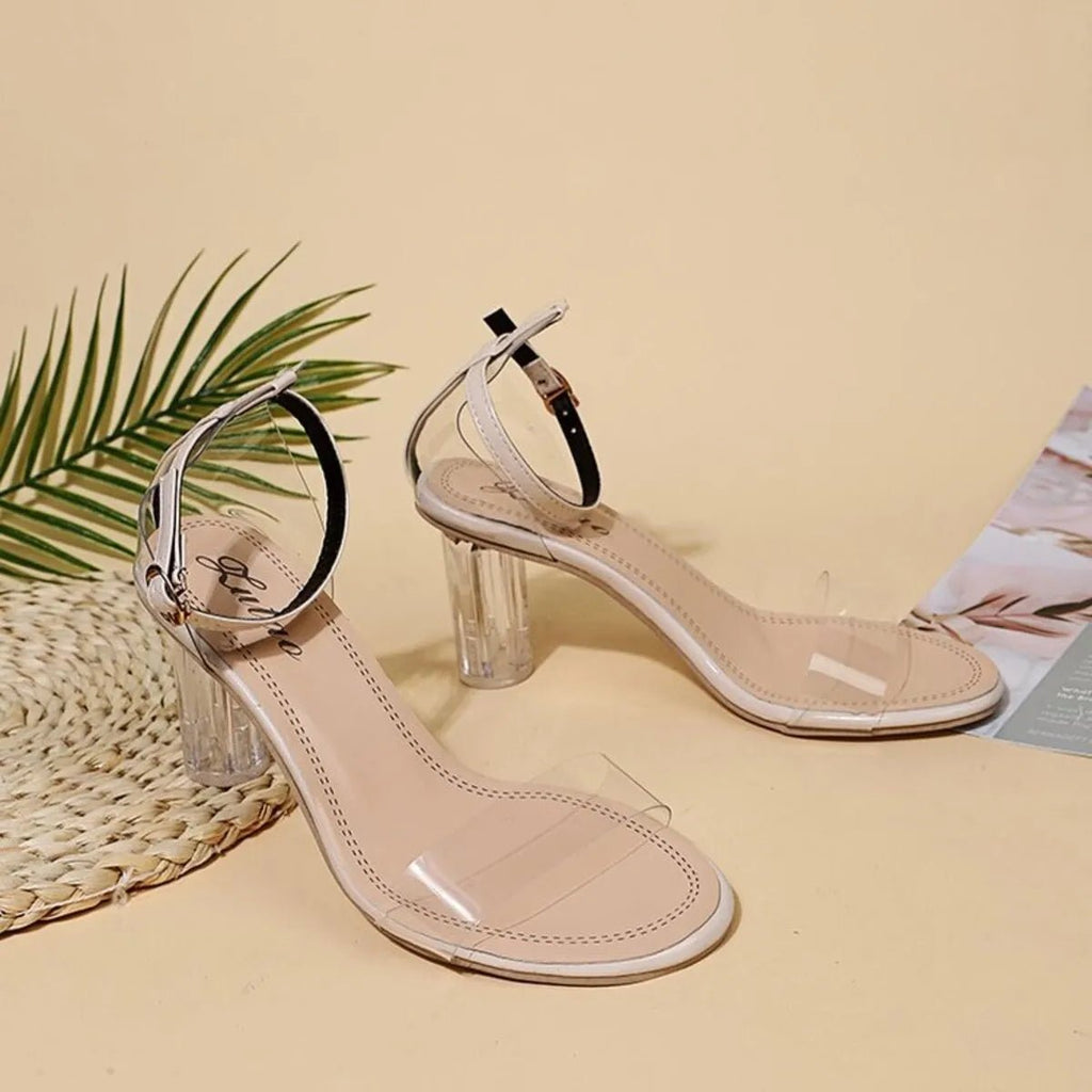 Women's faux leather block heel ankle strap sandals by Trendsi, featuring a chic design and comfortable fit.