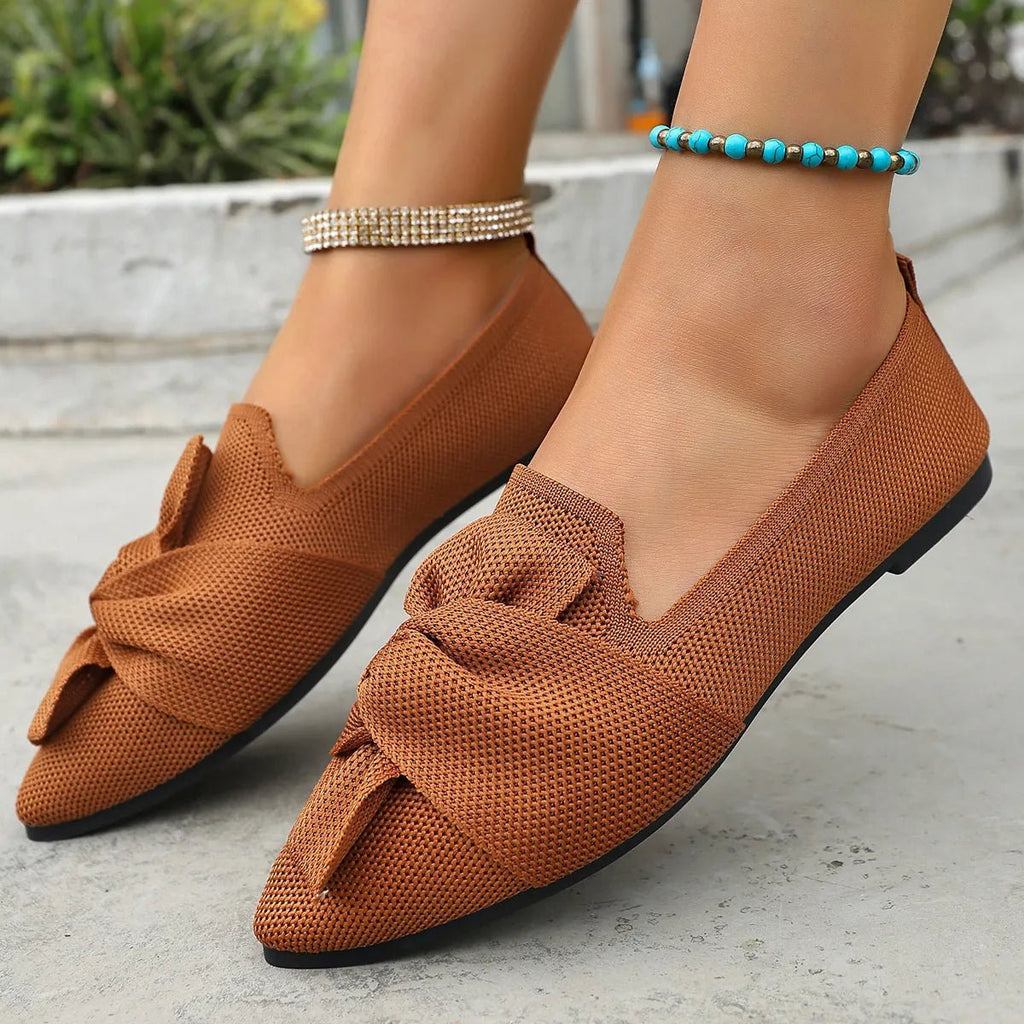 Elegant Trendsi pointed toe flat slip-on shoes with bow embellishment, perfect for stylish, comfortable everyday wear.