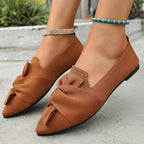 Elegant Trendsi pointed toe flat slip-on shoes with bow embellishment, perfect for stylish, comfortable everyday wear.