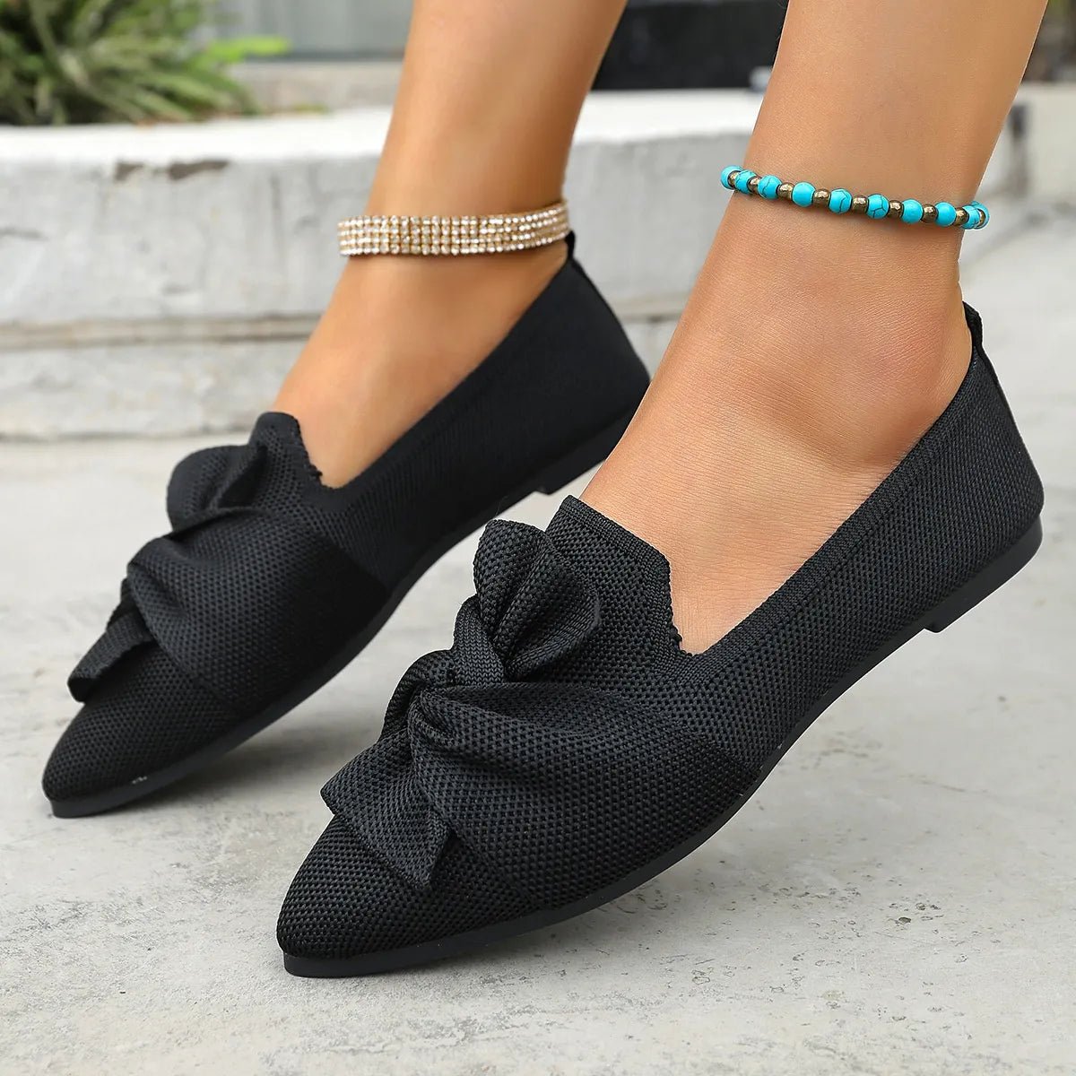 Elegant Trendsi pointed toe flat slip-on shoes with bow embellishment, perfect for stylish comfort and easy wear.