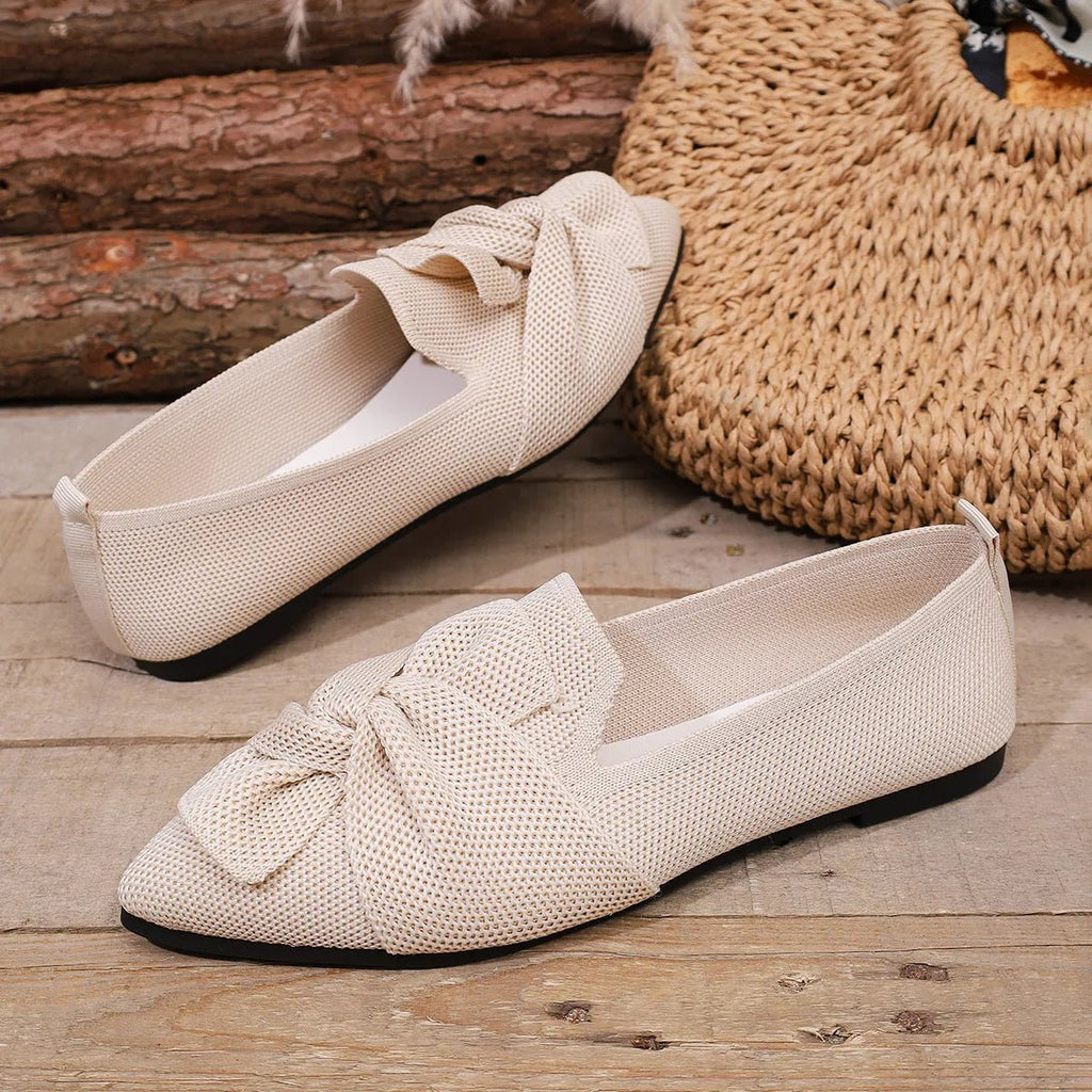 Elegant Trendsi pointed toe flat slip-on shoes with bow embellishment, perfect for stylish and comfortable everyday wear.