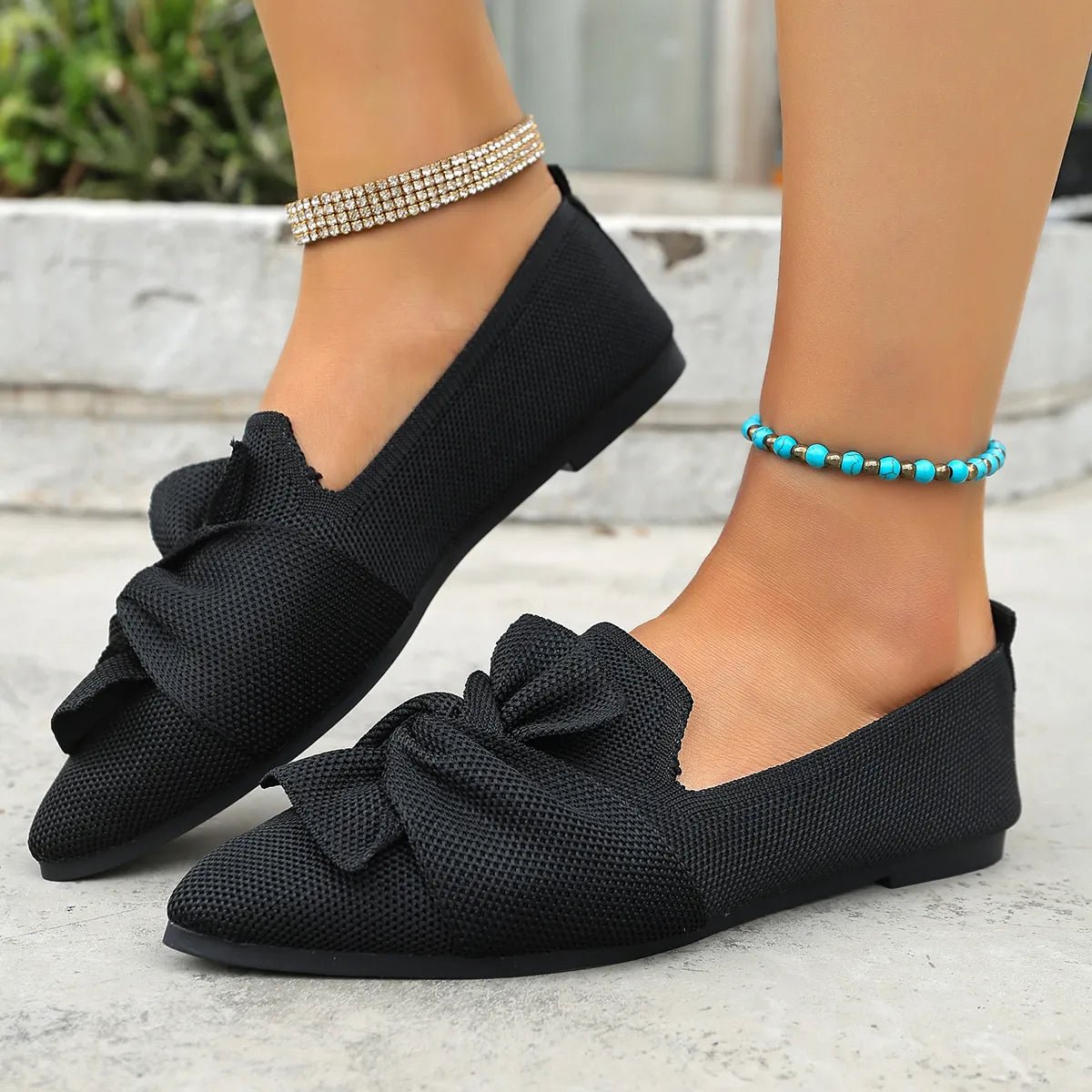 Elegant Trendsi pointed toe flat slip-on shoes with bow embellishment, perfect for stylish, comfortable everyday wear.