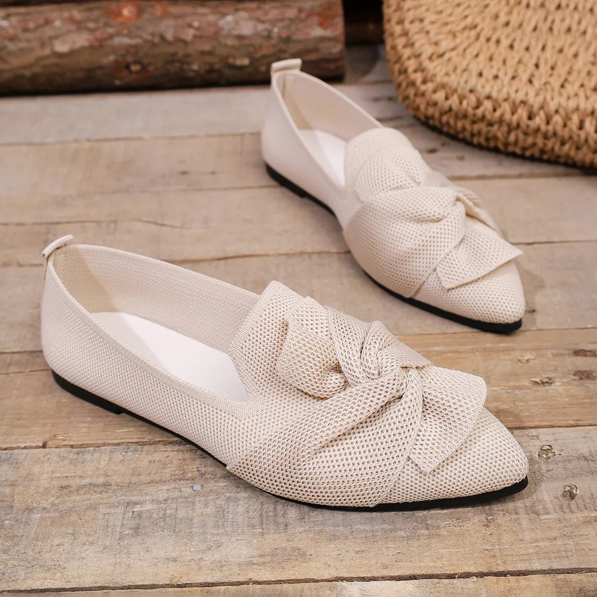 Elegant bow embellished pointed toe flat slip-on shoes by Trendsi, featuring a sleek design and comfortable fit.