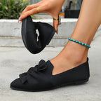 Elegant Trendsi pointed toe flat slip-on shoes with bow embellishment, perfect for stylish, comfortable everyday wear.