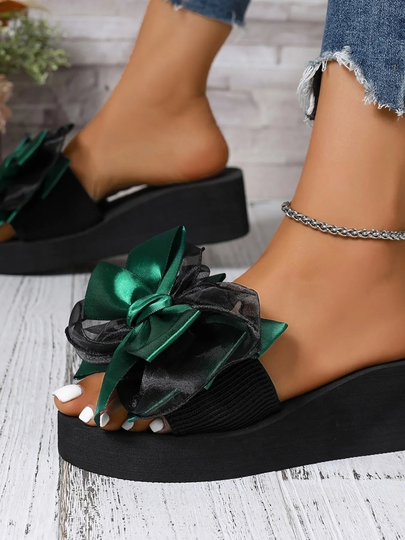 Women's bow-tie platform wedge sandals with mid-heel, stylish summer shoes featuring comfortable straps and trendy design.
