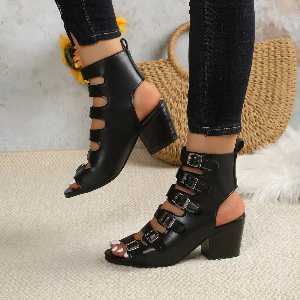 Women's buckle block heel sandals with mid-height heel and stylish design, perfect for dressier occasions.