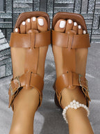 Women's PU leather flat sandals with buckle straps from Trendsi, featuring a comfortable and stylish design for casual wear.