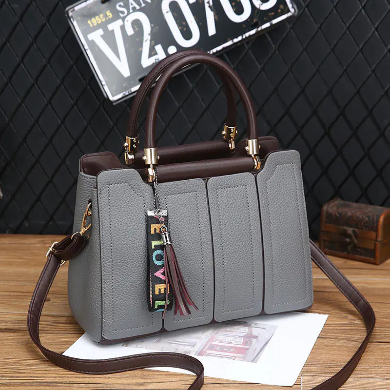 Women's shoulder tote bag by Plush Fashion Hub, stylish women's purse with spacious interior and elegant design.