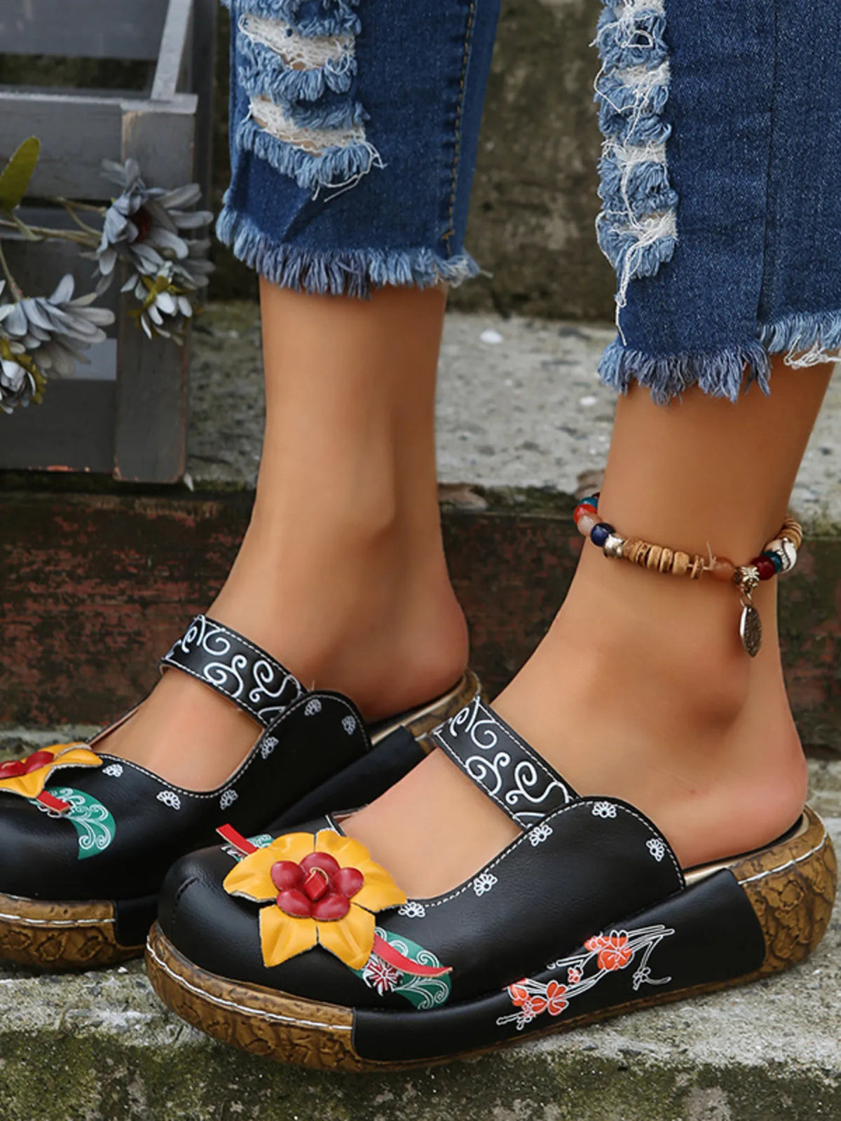 Flower round toe sandals by Trendsi featuring a floral design, open toe, and comfortable flat sole on a neutral background.