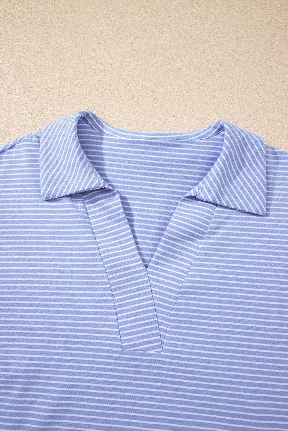 Lilian Dolman Sleeve Polo Shirt Set by Threaded Pear, featuring a stylish short set with dolman sleeves and a classic polo design.