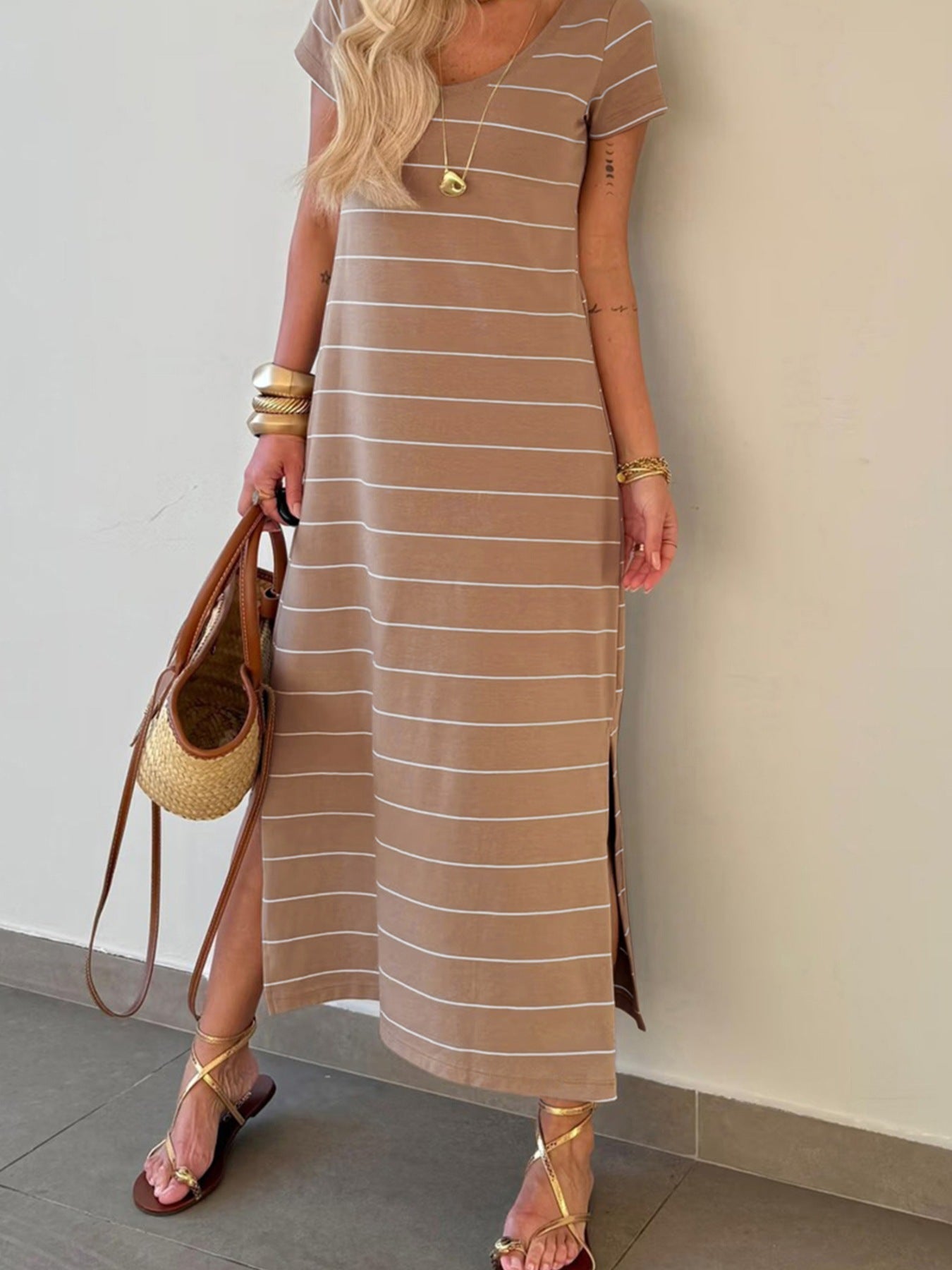 Women's striped short sleeve maxi T-shirt dress with side slit, by Plush Fashion Hub, featuring a casual, comfortable fit.