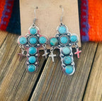 Turquoise cross-shaped earrings by Shopimist featuring vibrant artificial turquoise stones and silver-tone hooks.