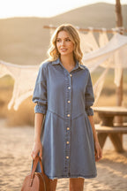 Women's three-quarter sleeve denim dress with ruffle details and a mid-length fit by FitiqueFit.