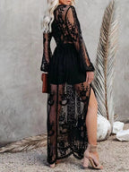 Elegant floral lace high-slit maxi dress by Trendsi, featuring intricate lace details and a flowing silhouette for formal occasions.