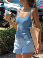 Scoop neck knit tank top from Trendsi, featuring a fitted design and soft, cozy fabric in a neutral color.