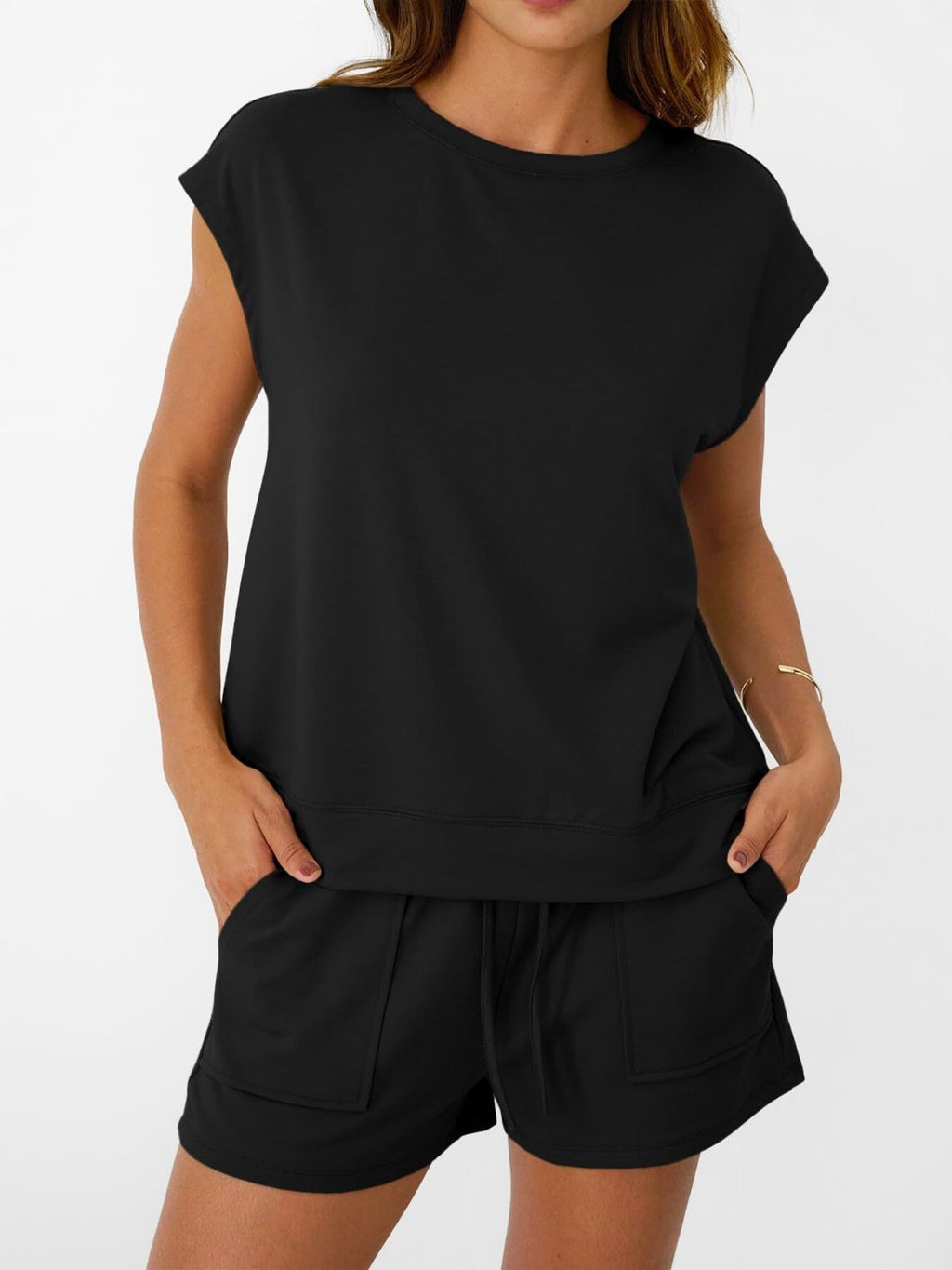 Women's soft round neck cap sleeve lounge set with drawstring shorts by Plush Fashion Hub, displayed on a hanger.