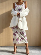 Floral print top and bodycon skirt set by Trendsi, featuring a stylish matching clothing ensemble with vibrant floral patterns.