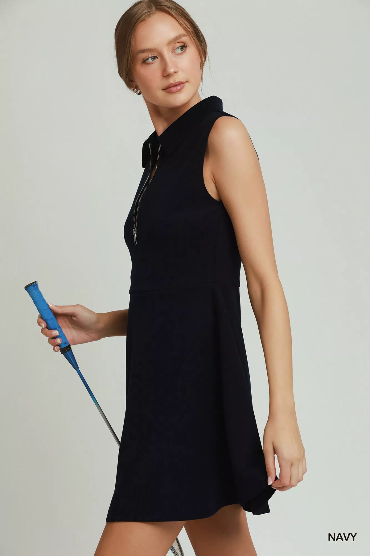 Plush Fashion Hub Umgee collared quarter zip tennis dress in lightweight fabric, shown on a hanger with a casual sporty style.