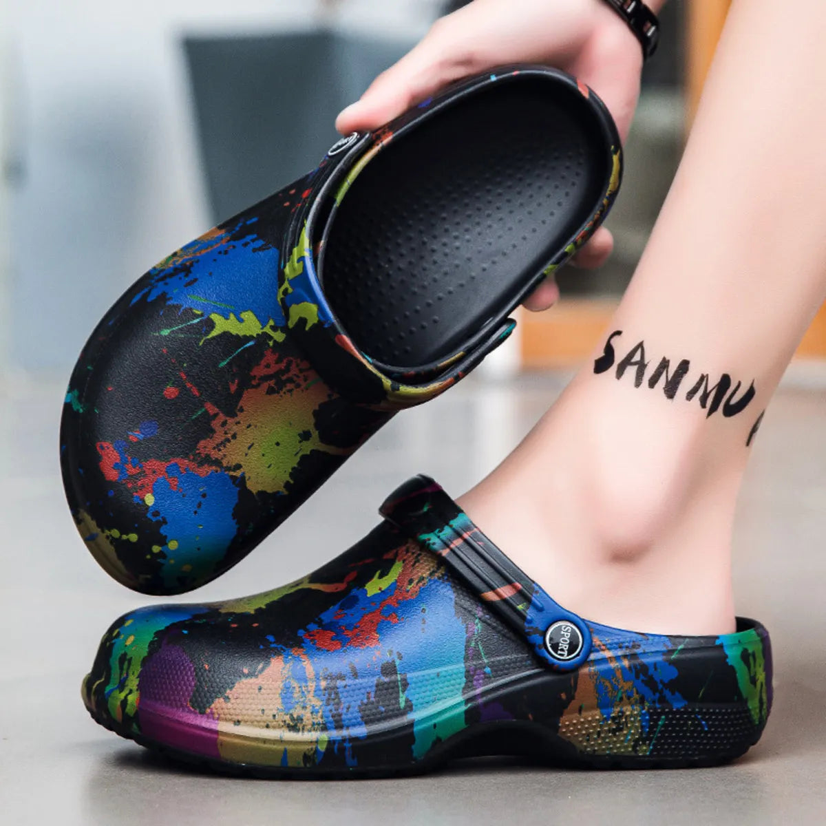 Men's colorful paint splash sandals, trendy footwear by Trendsi featuring vibrant, artistic design and comfortable open-toe style.