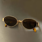 Vintage oval sunglasses by FitiqueFit with light luxury gold and silver frames, stylish eye wear for a sophisticated look.