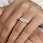 Sterling silver ring with 1 carat moissanite gemstone, showcasing a sparkling, elegant design.