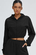 Svelte UV protection crop hoodie by Fitglutes Activewear, featuring lightweight outerwear with a fitted design and sporty style.