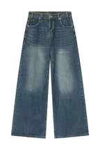 Light blue wide leg jeans with pockets from Trendsi, showcasing a relaxed fit and stylish design for casual wear.