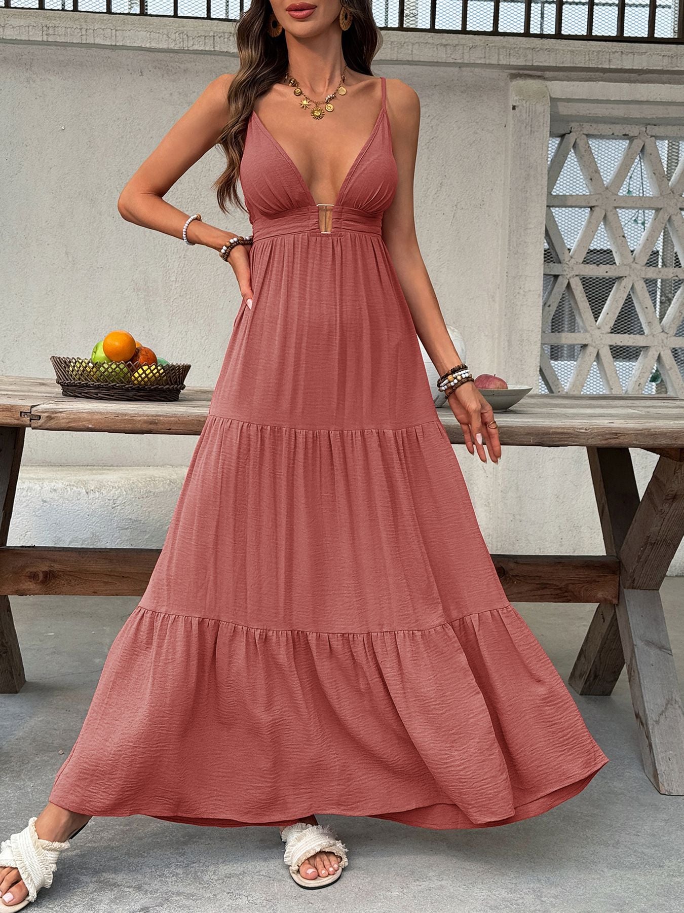 Flowy women's deep V-neck tiered maxi dress with smocked bodice, boho beach style by Plush Fashion Hub.