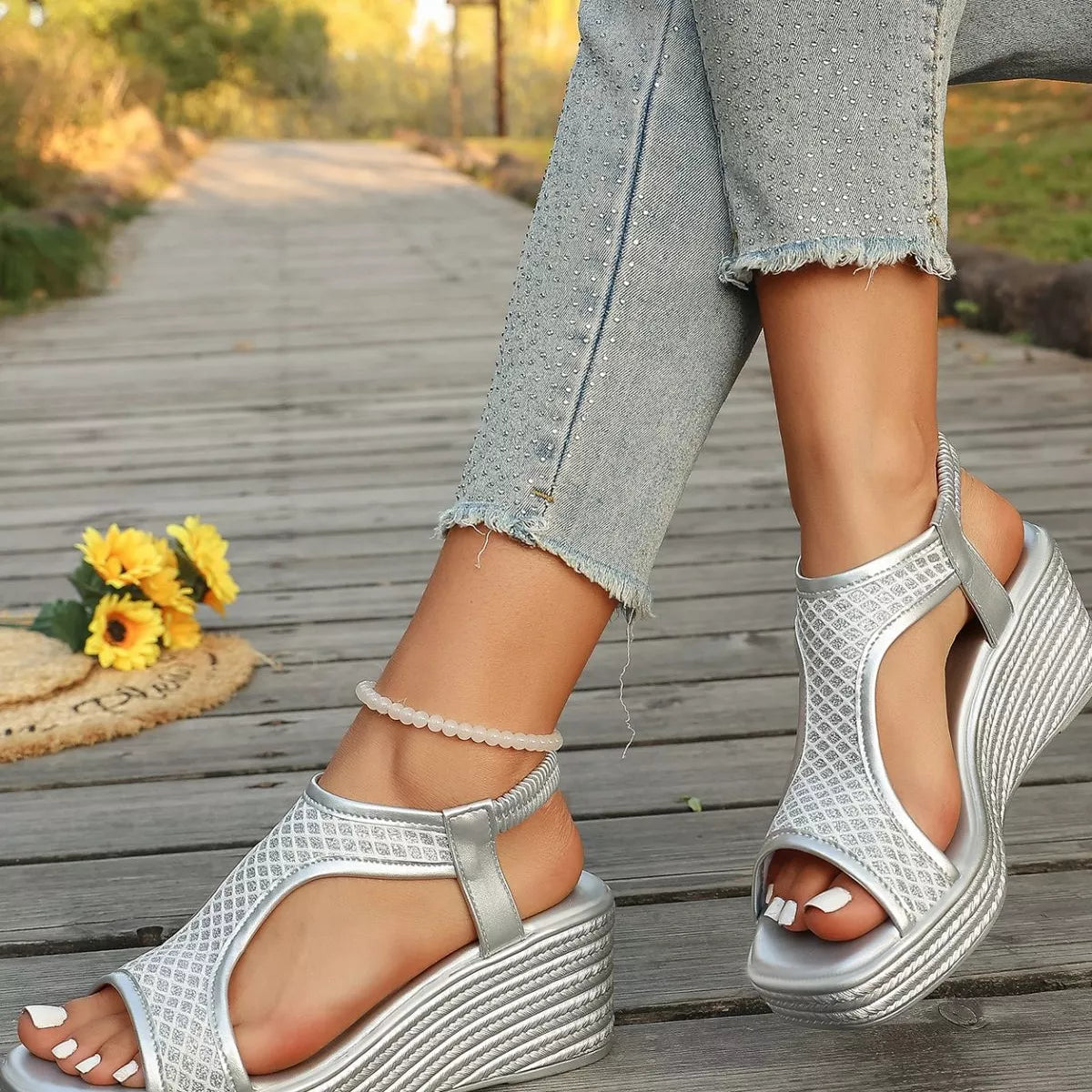 Open toe wedge sandals by Shopimist featuring a stylish design with a comfortable heel and neutral color, perfect for summer wear.