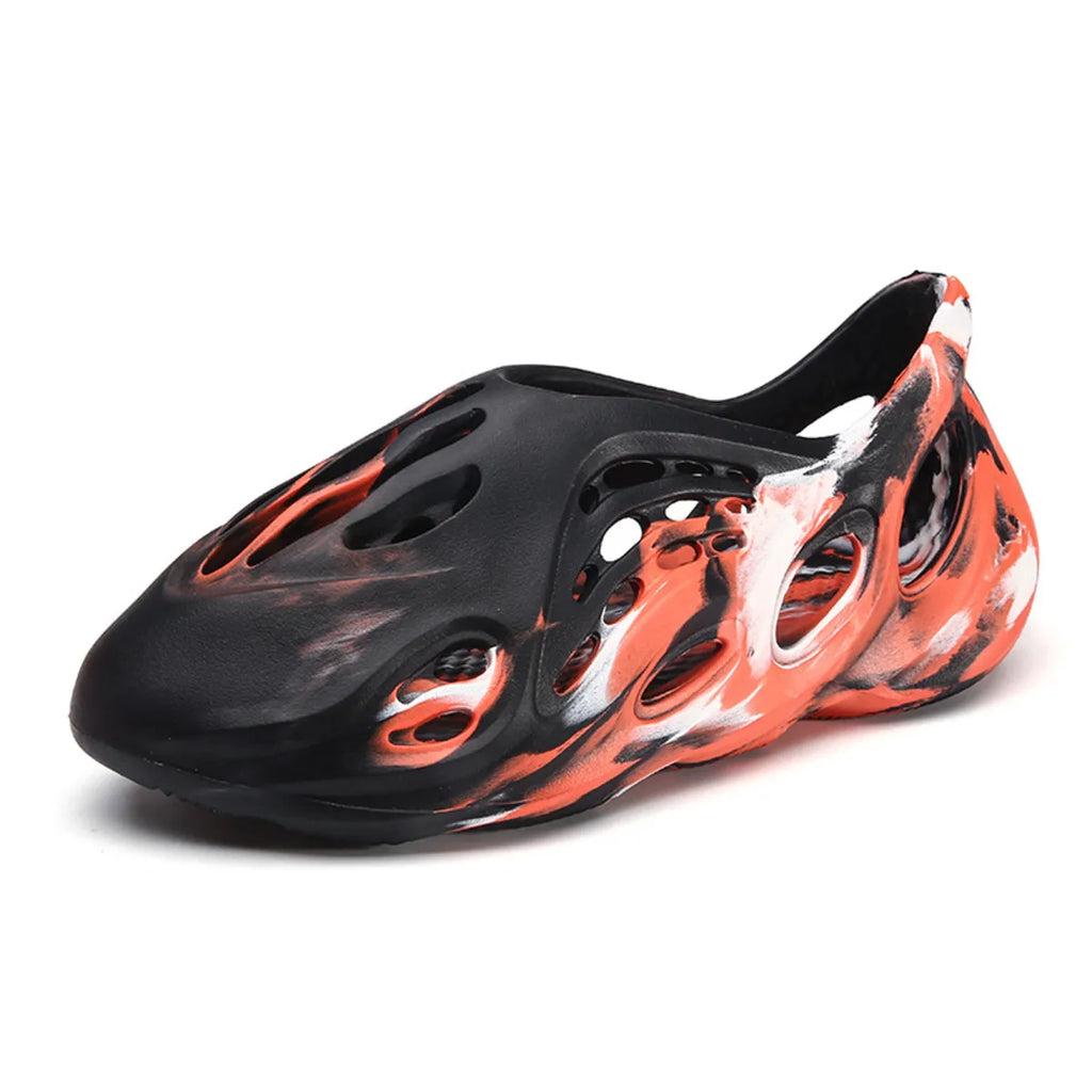 Trendsi hollow-out flat sandals featuring open toe design and stylish cut-out details, perfect for casual summer footwear.
