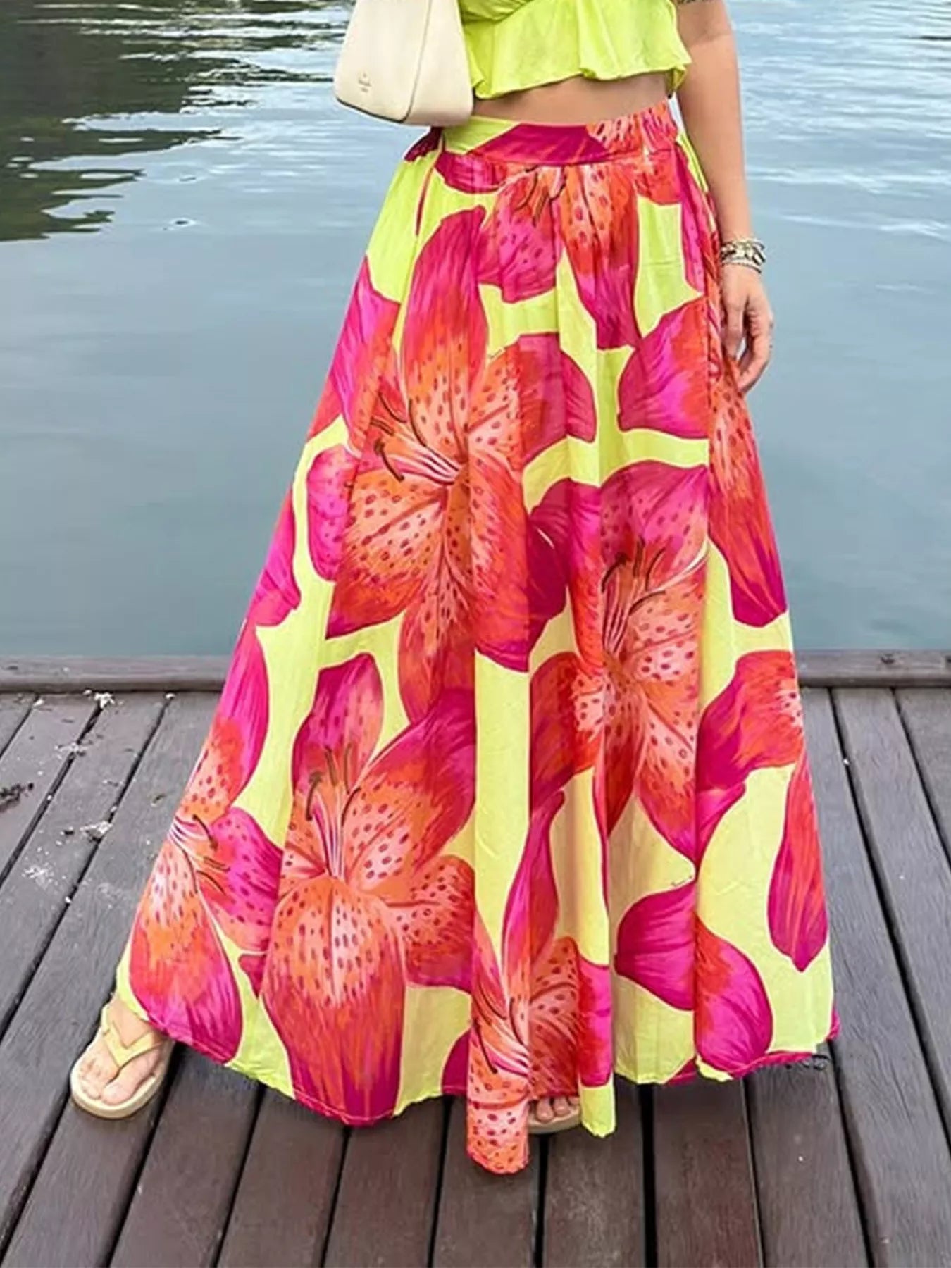 Women's floral print flowy maxi skirt with pockets, lightweight boho style, featuring a vibrant floral pattern and comfortable design.