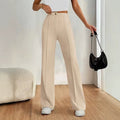 Women's high-waisted straight flare pants with stitching detail from FitiqueFit, casualwear style, shown on a model.