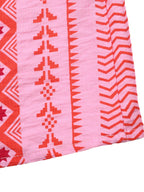 Printed halter neck smocked midi dress with side slit, stylish Trendsi dress featuring a fitted bodice and flowy skirt.