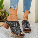 Women's chic buckle detail block heel sandals by Trendsi, crafted with premium faux leather, showcasing stylish design and comfortable fit.