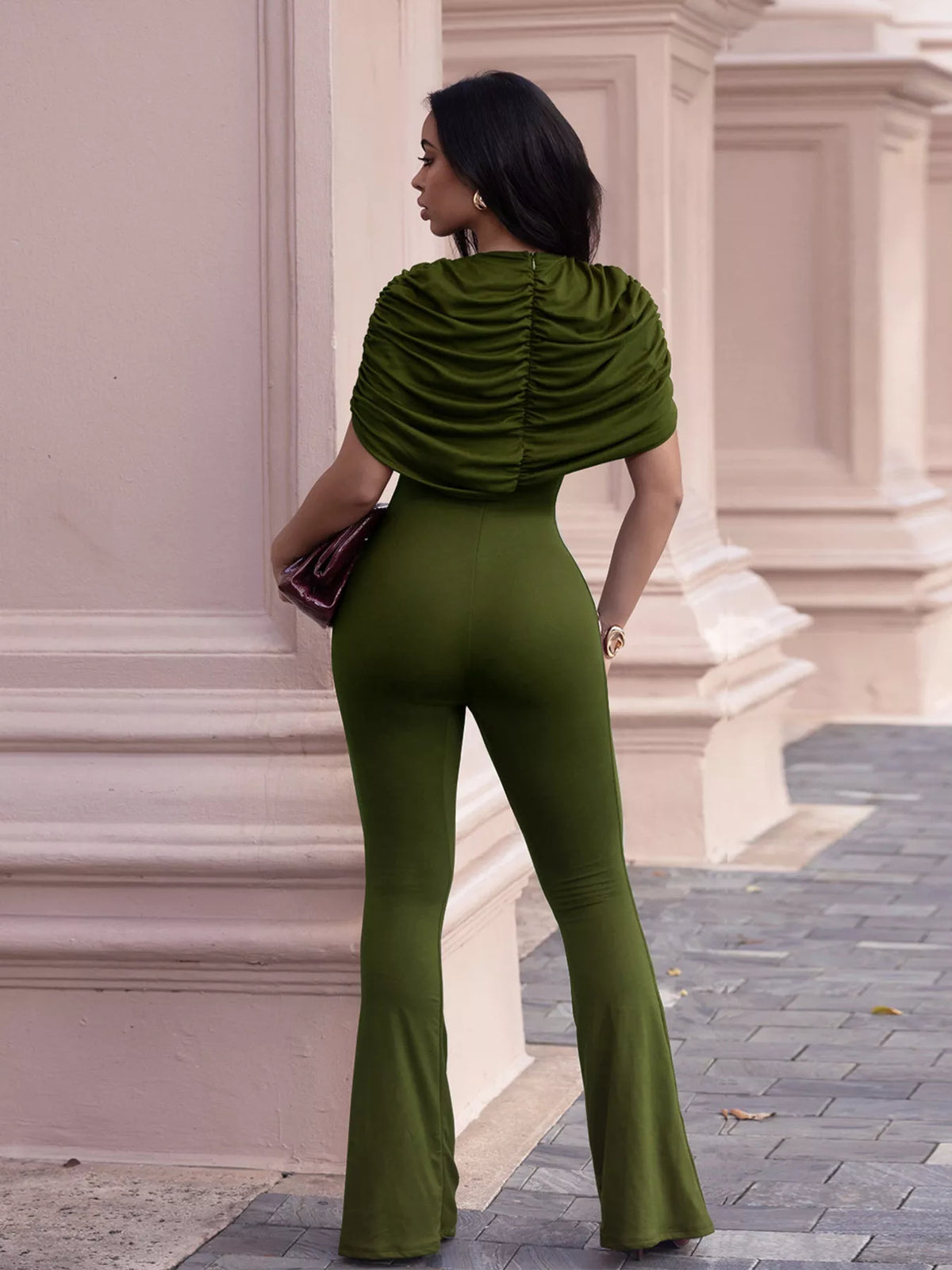 Ruched flare leg jumpsuit by Plush Fashion Hub featuring a fitted bodice, wide legs, and stylish ruching detail.