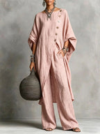 Women's casual drop shoulder three-quarter sleeve irregular shirt and matching pants set by Plush Fashion Hub.
