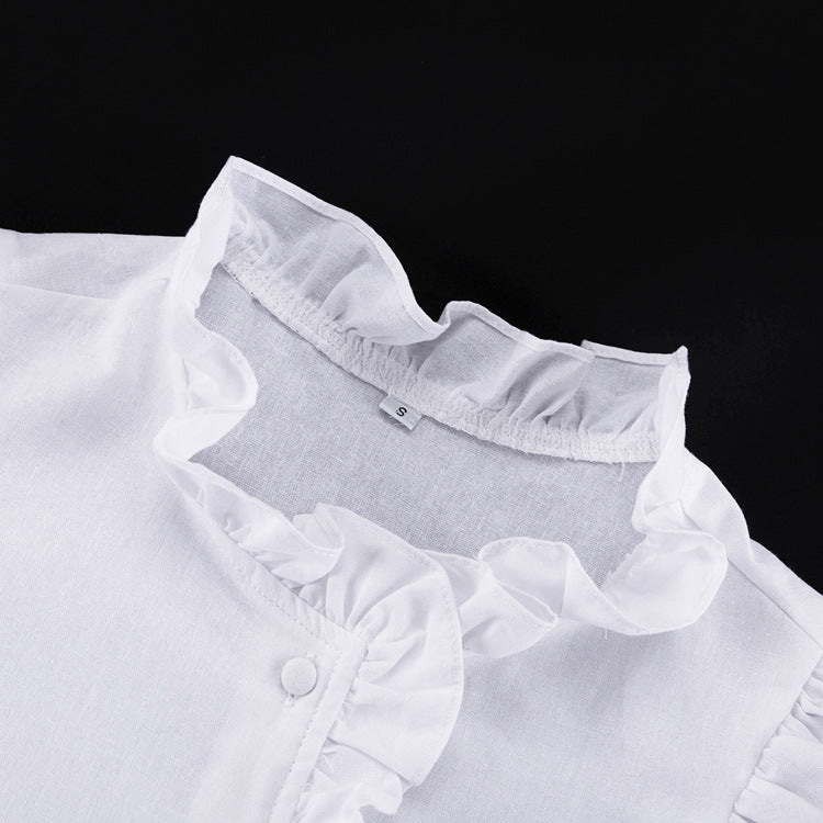 Women's ruffled linen-blend cropped blouse and shorts set by FitiqueFit, featuring a stylish ruffled top and matching shorts.