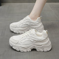 White breathable women's footwear by FitiqueFit with thick soles, stylish design, and cushioned comfort for everyday wear.