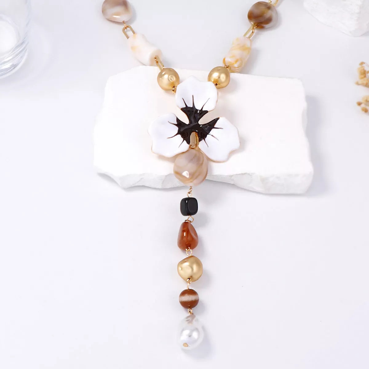 Shimmering alloy dripping oil flower resin Y-shaped necklace with intricate design, stylish jewelry from Plush Fashion Hub.