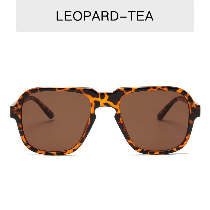 Vintage large rim sunglasses from Plush Fashion Hub featuring bold driving and fashion shades with dark lenses and stylish frame.
