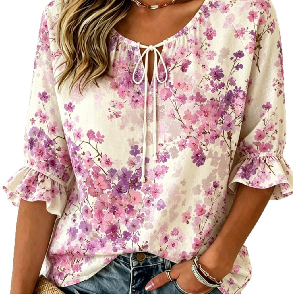 Women's floral print three-quarter sleeve casual shirt by FitiqueFit, featuring a relaxed retro style and vibrant floral design.