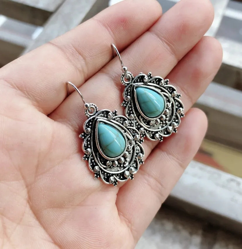 Artificial turquoise alloy teardrop dangle earrings from Plush Fashion Hub, showcasing vibrant blue teardrop design and shiny alloy finish.